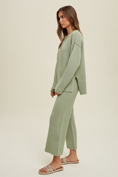 Stay warm and cozy in this sage textured sweater set—with buttons to add some flair and an elastic waistband for extra comfort. It's the perfect pick for any day!