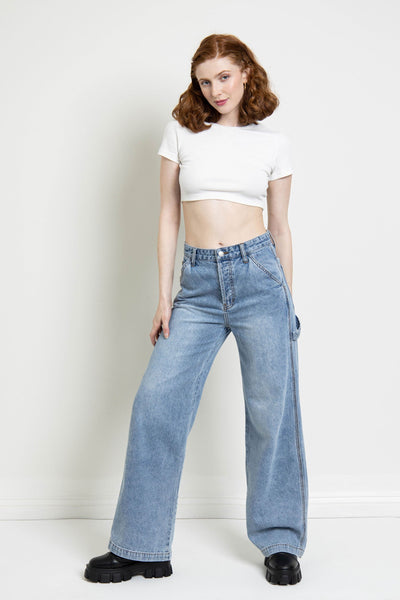 Enjoy the perfect blend of comfort and utility with this ultra high-rise carpenter jean. The high-waisted fit will keep you looking stylish while the cargo loops and baggy wide legs provide plenty of interesting details! Say hello to your new favorite jeans!