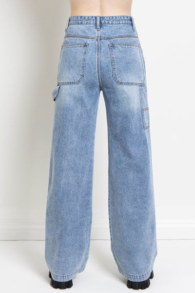 Enjoy the perfect blend of comfort and utility with this ultra high-rise carpenter jean. The high-waisted fit will keep you looking stylish while the cargo loops and baggy wide legs provide plenty of interesting details! Say hello to your new favorite jeans!