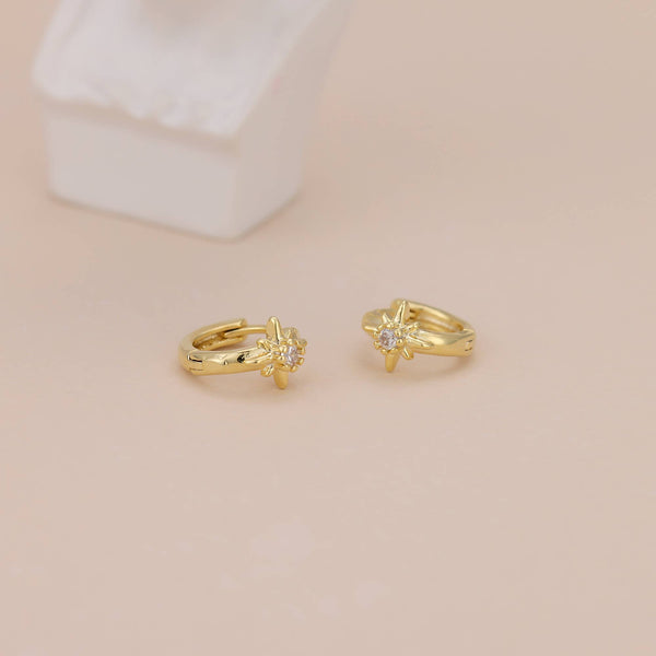 E168 star huggie earring, star huggies, star hoop, starburst: Yellow Gold - Lulu Bella Boutique