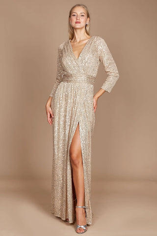 This elegant long sleeve gown features a deep V-neckline and a full back. The silhouette is highlighted with a high slit that blends with the train.