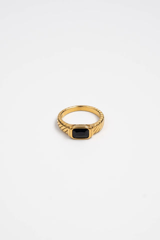PRODUCT DETAILS Water Resistant 💧METAL: 18K gold over stainless steel. Hypoallergenic DESIGNER NOTE: This new ring is a modern statement meant to be worn daily. Its classic combination of gold and black matches any outfit. 
