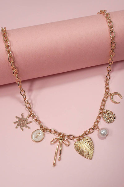 SUN BOW PEARL CROSS DISC U CHARM NECKLACE | 80N1182: Gold