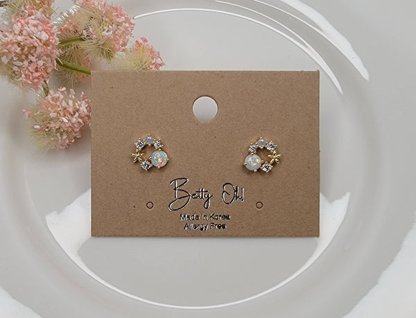 LAB GROWN OPAL POST EARRINGS.: White