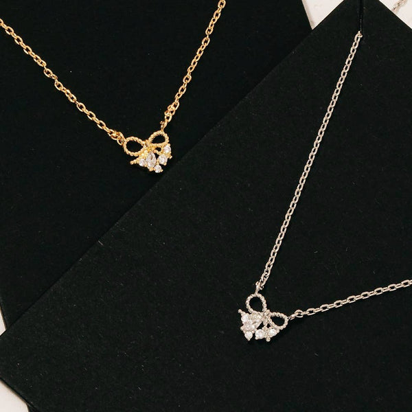 Gold Dipped Cz Studded Bow Pendant Necklace: G - Lulu Bella Boutique