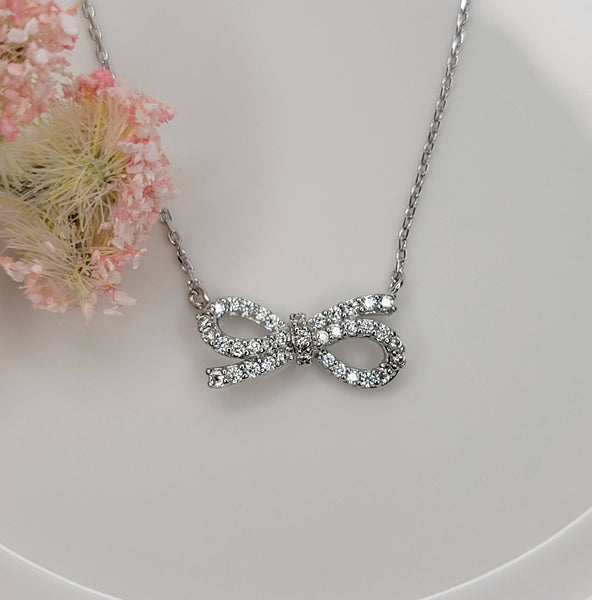 BOW NECKLACE.: Silver - Lulu Bella Boutique