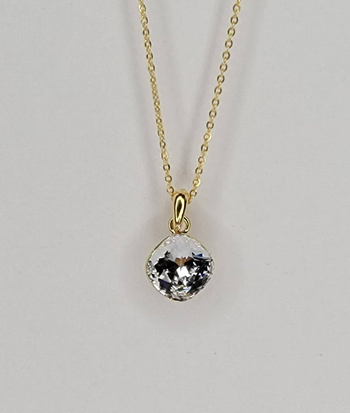 SWAROVSKI CRYSTAL CHARM NECKLACE.: BABY BLUE