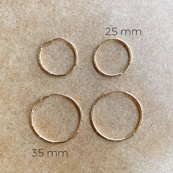 18k Gold Filled Continuous Twisted Tube Hoop Earrings Endless Style: 35mm - Lulu Bella Boutique