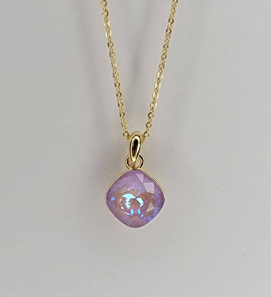 SWAROVSKI CRYSTAL CHARM NECKLACE.: CLEAR/GOLD