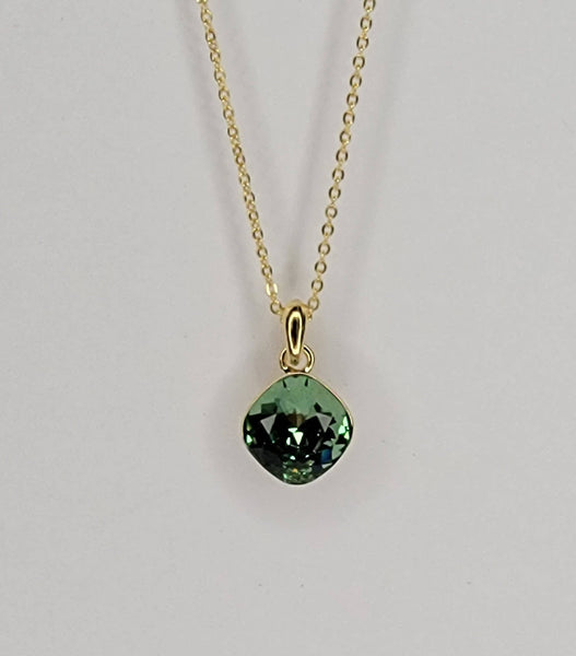 SWAROVSKI CRYSTAL CHARM NECKLACE.: CLEAR/GOLD