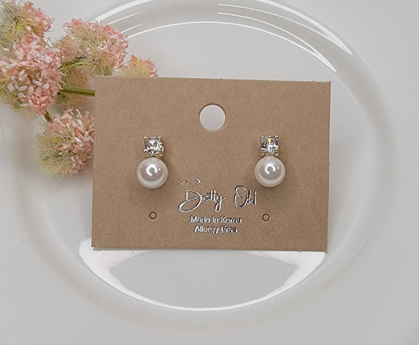 CZ AND PEARL DECORATED POST EARRINGS. - Lulu Bella Boutique