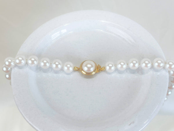 Single strand large white pearl necklace, pearl necklace