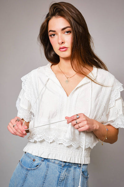 36900T - Eyelet Embroidered Tassel Tie Front Crop Top: OFF WHITE / S - Lulu Bella Boutique