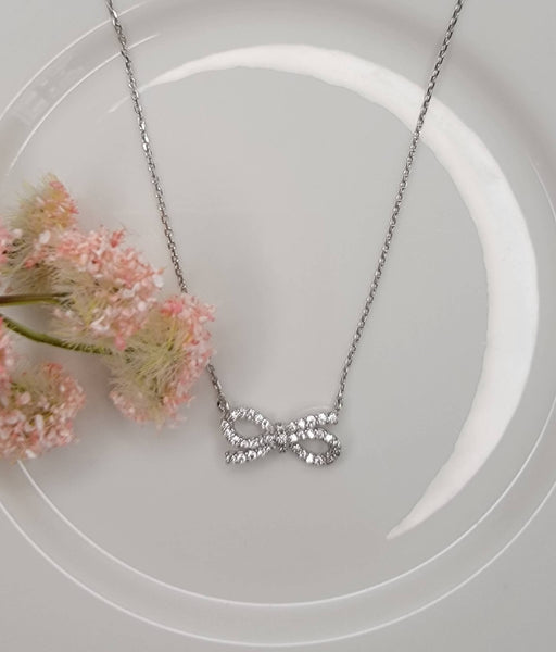 BOW NECKLACE.: Silver - Lulu Bella Boutique