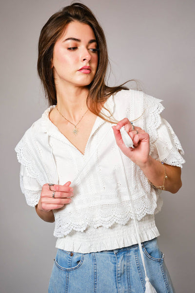 36900T - Eyelet Embroidered Tassel Tie Front Crop Top: OFF WHITE / S - Lulu Bella Boutique