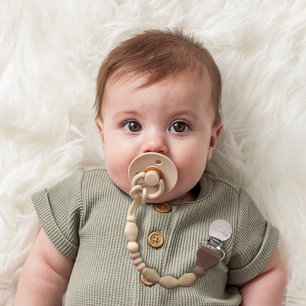 Itzy Paci Strap Plus™: Pink Bows