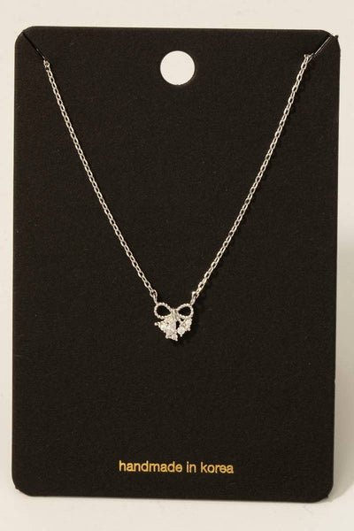 Gold Dipped Cz Studded Bow Pendant Necklace: G - Lulu Bella Boutique