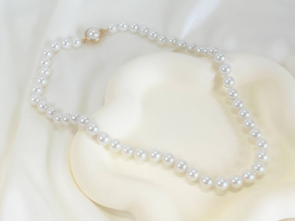 Single strand large white pearl necklace, pearl necklace