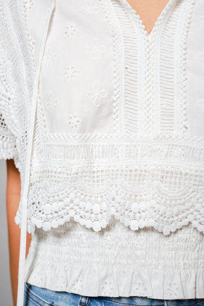 36900T - Eyelet Embroidered Tassel Tie Front Crop Top: OFF WHITE / S - Lulu Bella Boutique