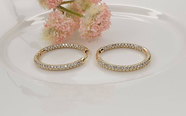 CLICKER EARRINGS.: GOLD