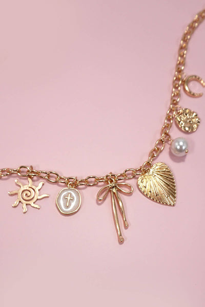 SUN BOW PEARL CROSS DISC U CHARM NECKLACE | 80N1182: Gold