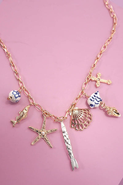 CHARM NECKLACE-PORCELAIN SEASHELL AND STARFISH | 80N92141: GOLD - Lulu Bella Boutique