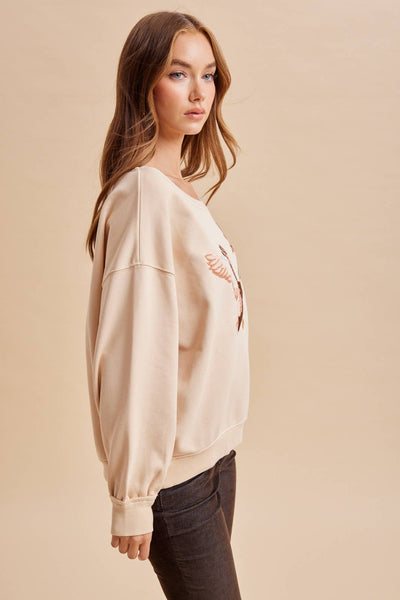 EMBROIDERED DUCK PULLOVER: CASHEW