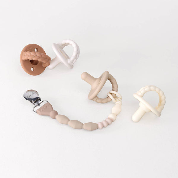 Itzy Paci Strap Plus™: Pink Bows
