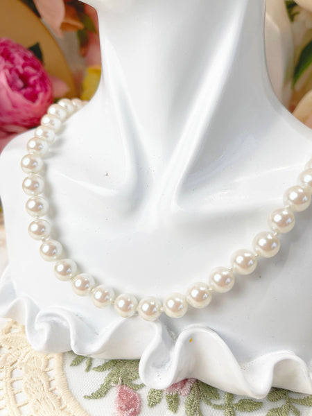 Single strand large white pearl necklace, pearl necklace