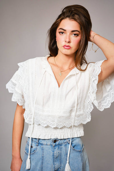 36900T - Eyelet Embroidered Tassel Tie Front Crop Top: OFF WHITE / S - Lulu Bella Boutique