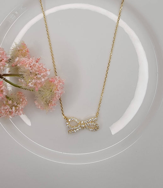 BOW NECKLACE.: Silver - Lulu Bella Boutique