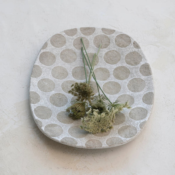 Serve up style in a unique way! This 16-1/2"x12-3/4" terra-cotta platter comes adorned with decorative wax relief dots, creating a unique look to make your dish stand out. Its white and cement color design is a fun and creative twist on traditional platters. Bon appetit!