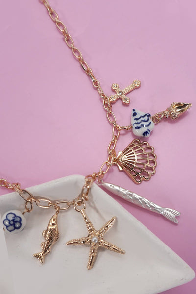 CHARM NECKLACE-PORCELAIN SEASHELL AND STARFISH | 80N92141: GOLD - Lulu Bella Boutique