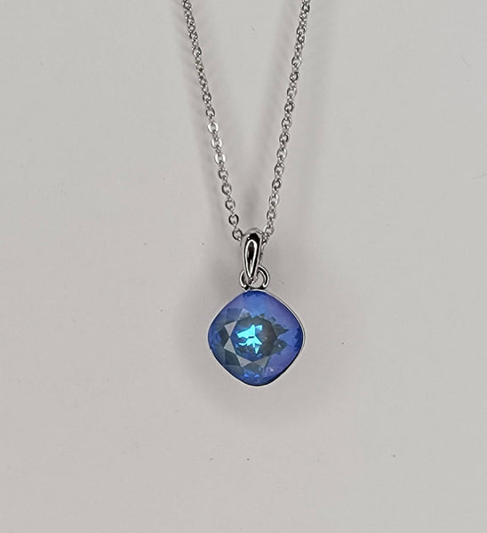 SWAROVSKI CRYSTAL CHARM NECKLACE.: BABY BLUE