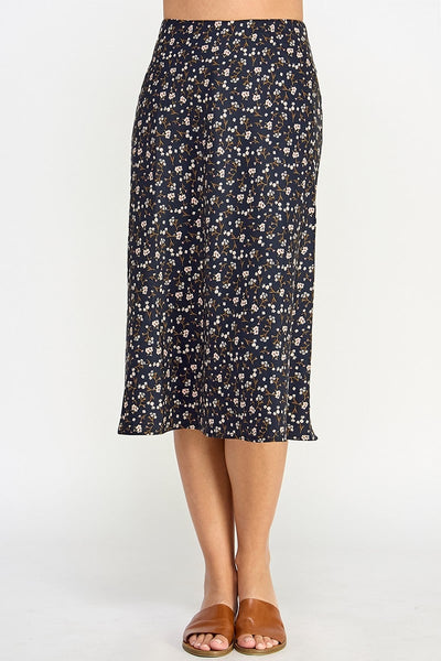 This Flower Print Bias Skirt is a stunning midi skirt crafted from lightweight fabric. The bias cut design creates a flattering silhouette, while the vibrant flower print makes it an ideal statement piece. An elegantly stylish addition to any wardrobe.