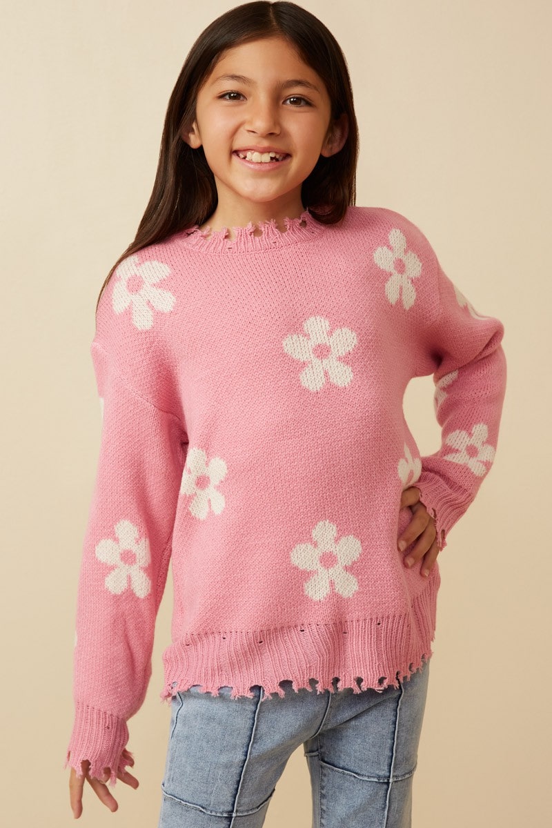 Stay comfy with this Daisy Knit Sweater - distressed hemline and dolman sleeves for that perfect lived-in look! Get your flower power on and keep cozy in this cute-as-a-button pullover.