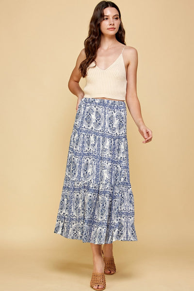 This stylish paisley-printed maxi skirt is made from denim blue fabric for a timeless look that will never go out of style. Personalize your style with a skirt that can be dressed up or down, perfect for any fashion occasion.