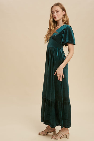 Feeling Fancy?! This dress has got you covered! It has the most flattering sleeves and waist line that is not only beautiful, but also so comfortable! The tiered maxi skirt adds the final touch that makes this dress so easy to wear!