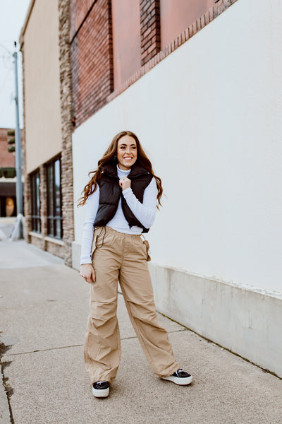 Parachute pants are back, and we are here for it! These pants are comfy, cool, and will be a new go to in your closet!   -Drawstring hem and waist -100% nylon