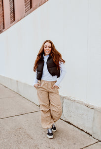 Parachute pants are back, and we are here for it! These pants are comfy, cool, and will be a new go to in your closet!   -Drawstring hem and waist -100% nylon